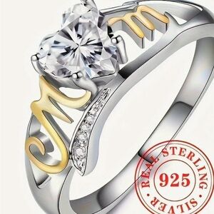 Elegant Silver and Gold Ring with Heart-Shaped Gemstone